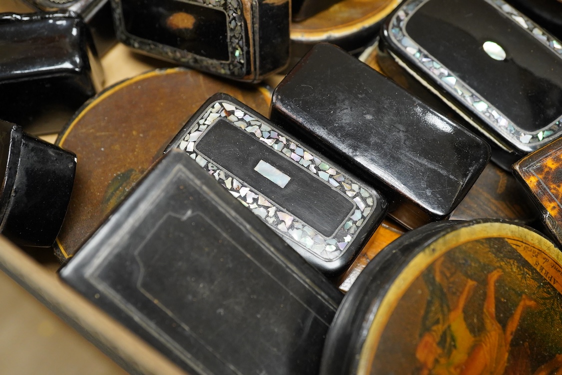 A collection of various snuff boxes to include papier mache examples, two with printed lids and some inlaid examples